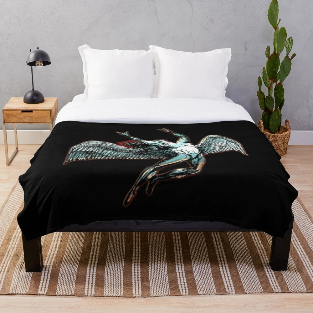 Led Zeppelin-inspired plush blanket with the iconic band's logo