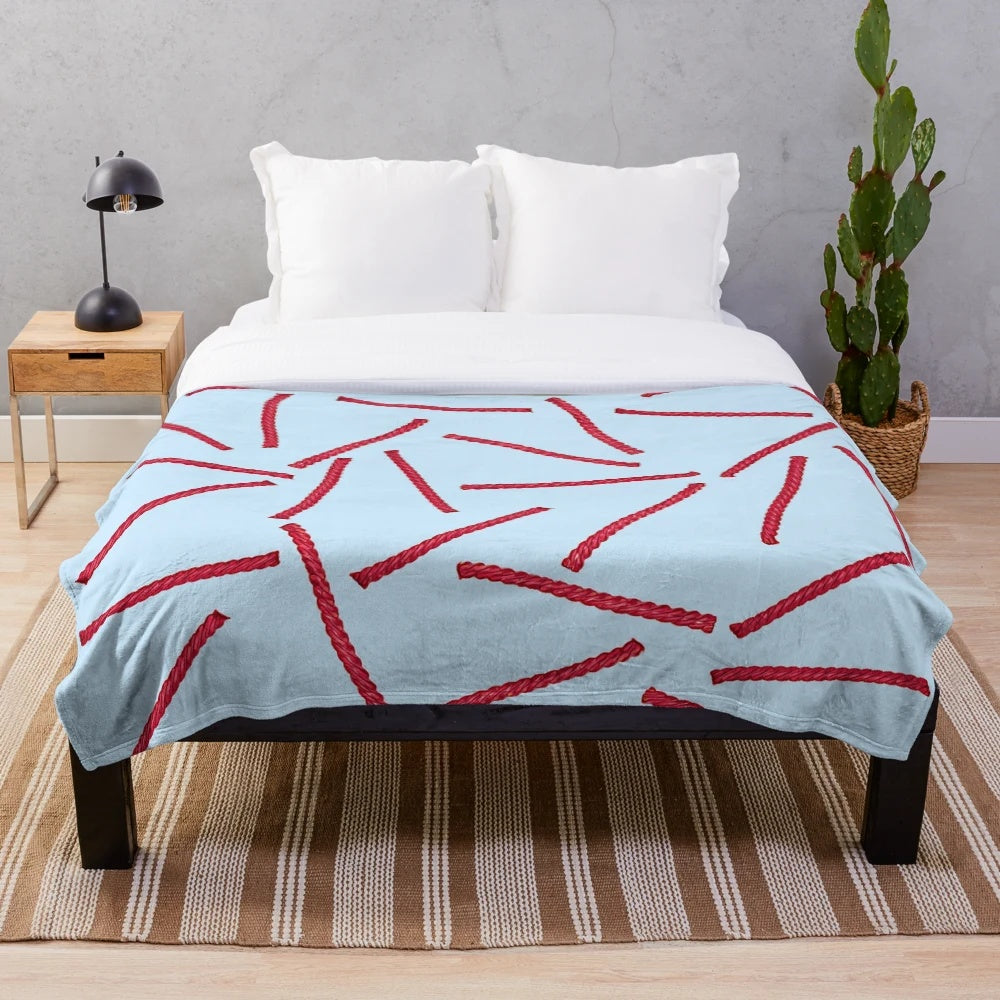 Red licorice candy-themed plush blanket