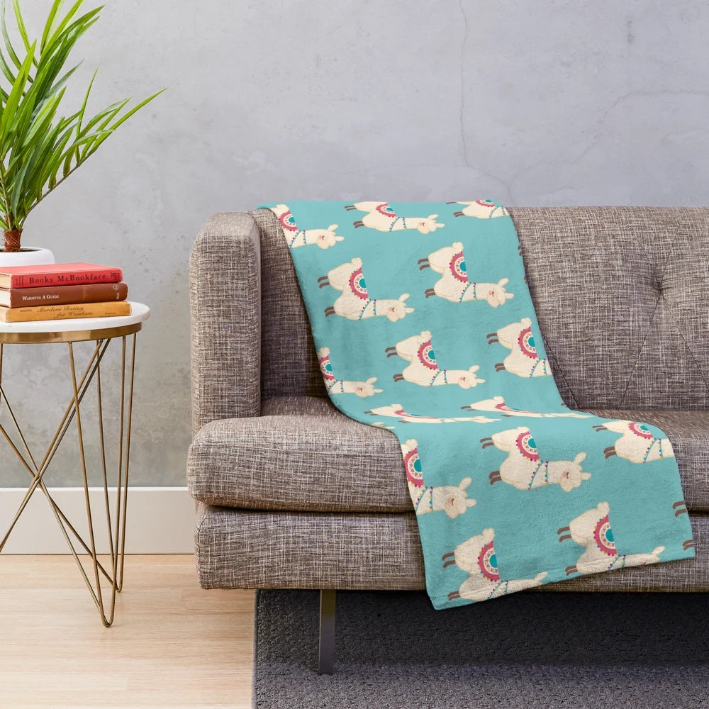 Llama plush blanket with a soft, fluffy texture and adorable lama pattern