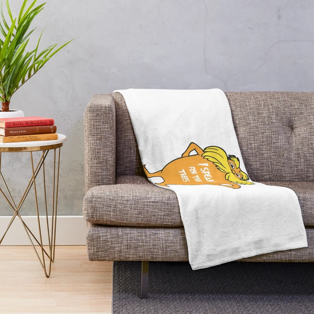 Soft and cuddly plush blanket with Lorax-inspired design, perfect for nature-loving kids