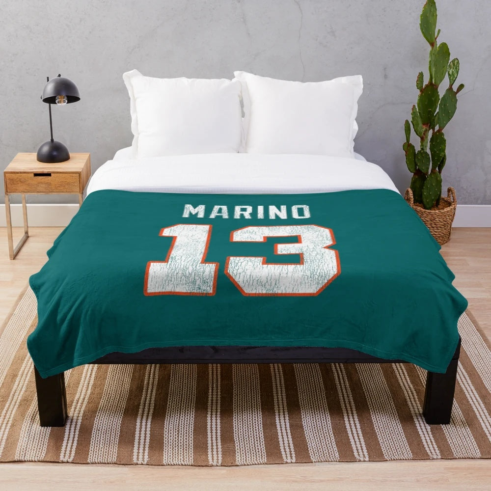Soft and warm plush blanket with a marine-inspired design for sports fans