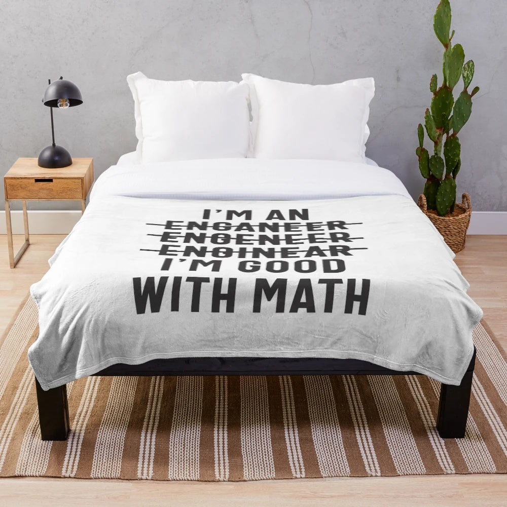 Plush blanket featuring an engineer-themed design with math and engineering-related graphics