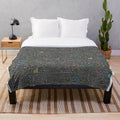 Cozy math lessons plush blanket featuring chalkboard designs and mathematical elements