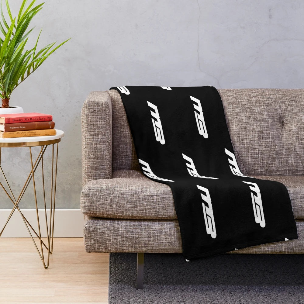 MB boats inspired plush blanket with blue, white, and pink colors