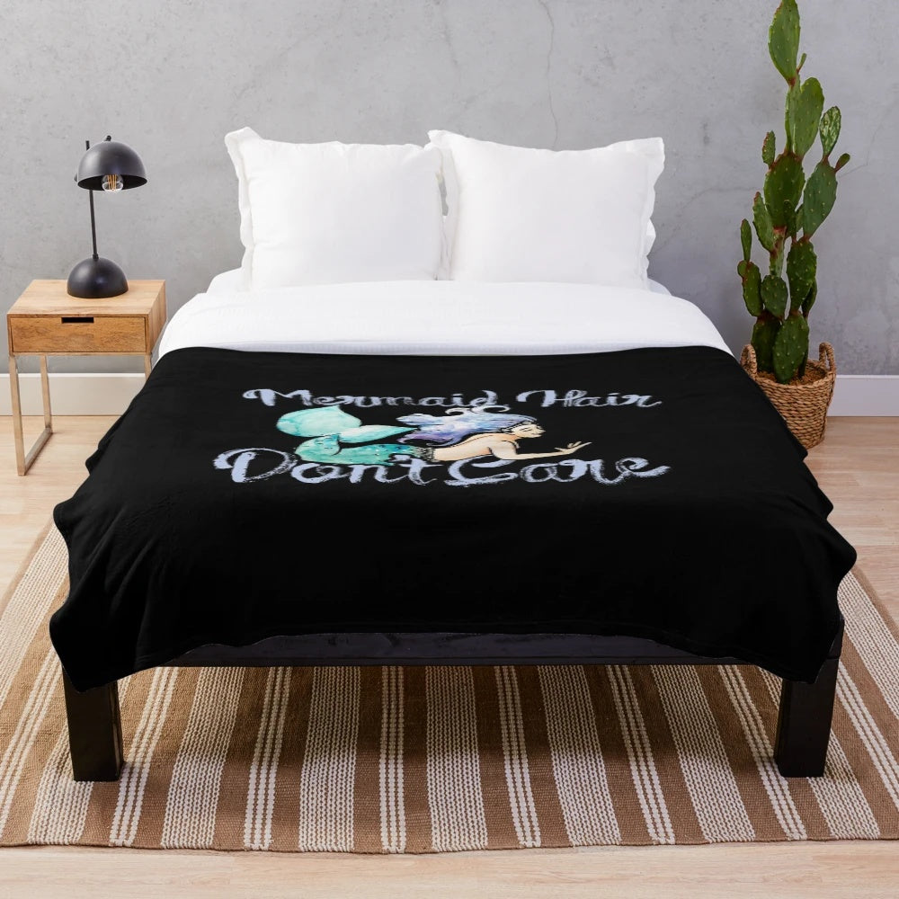 Mermaid-themed plush blanket with cozy design for ocean lovers