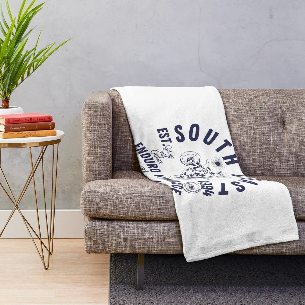 Motocross-themed plush blanket featuring motorcycle and dirt bike design