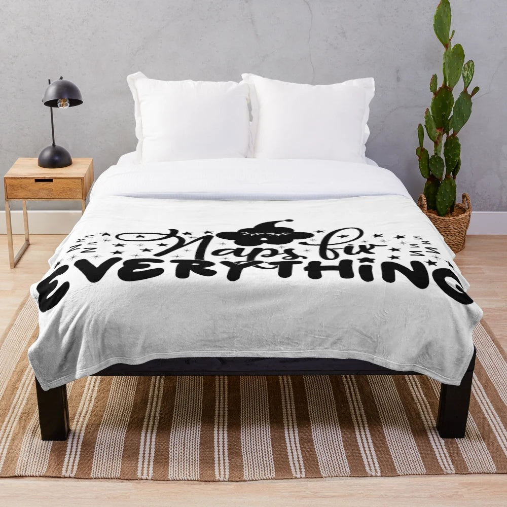 Plush nap blanket with "Naps Fix Everything" text