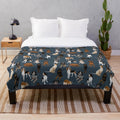 Navy blue plush blanket featuring a pack of coonhounds