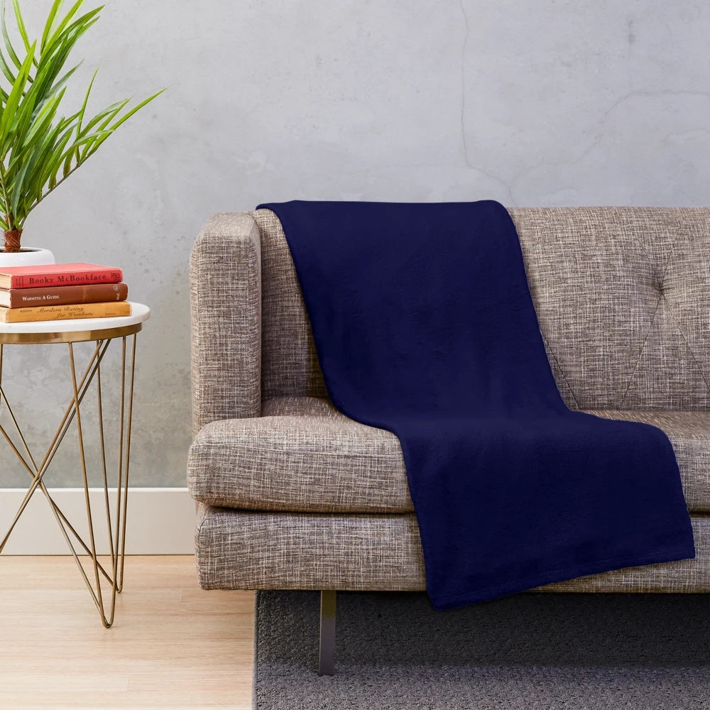 Navy blue plush blanket with solid color design