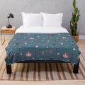Blue plush blanket with nutcracker ensemble design