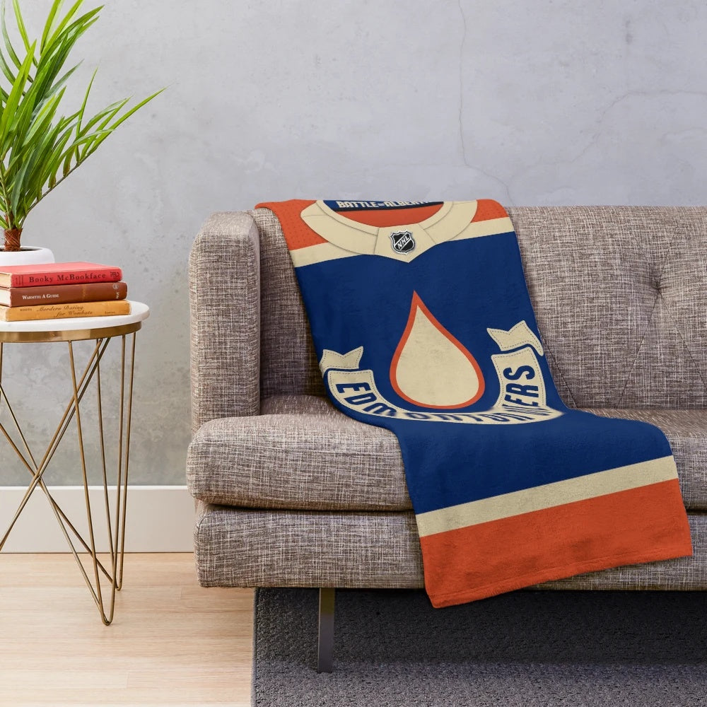Edmonton Oilers inspired plush blanket with heritage classic jersey design