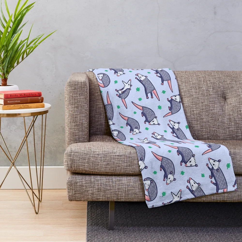 Soft and plush opossum pattern blanket