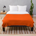 Orange plush blanket for cozy autumn snuggles