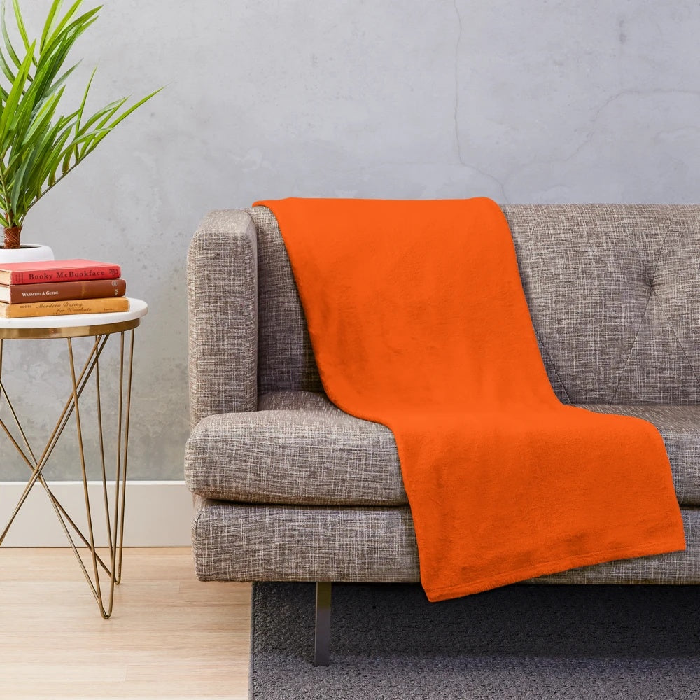 Orange plush blanket for cozy autumn snuggles