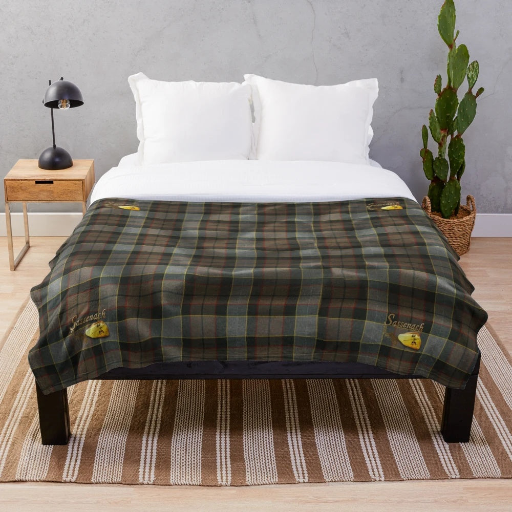 Outlander-inspired plush blanket with sassenach tartan design