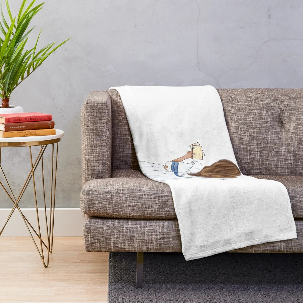 Plush blanket with paper hobbies design for a soft, cozy home