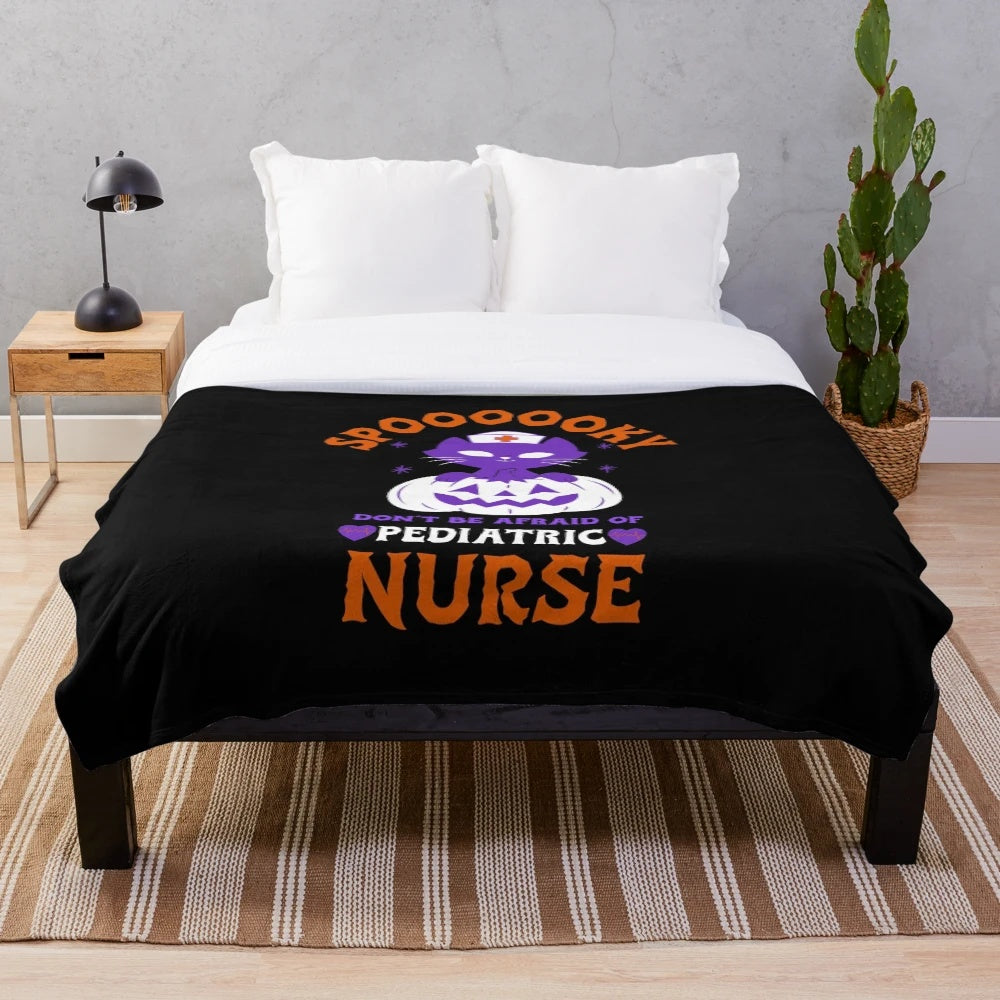 Pediatric nurse plush blanket with spooky and cute design
