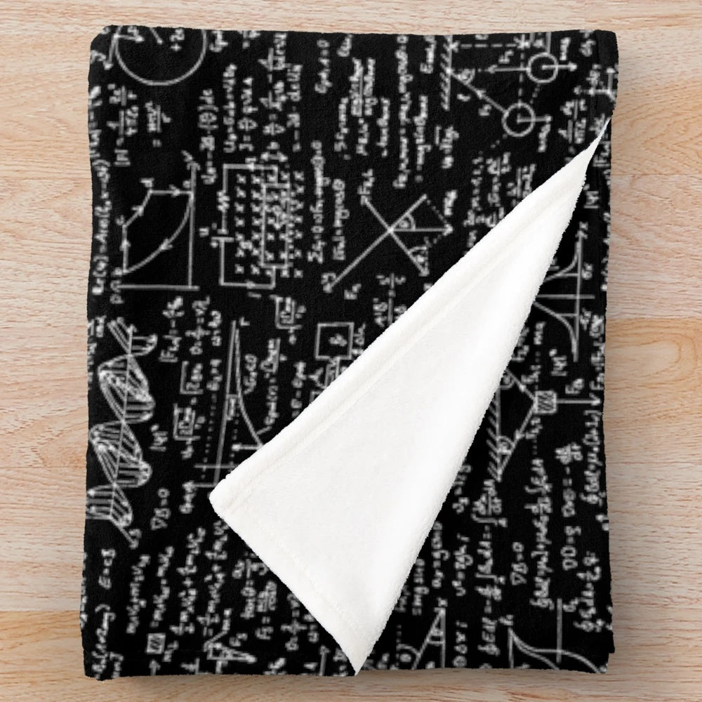 Black plush blanket with physics equations and mathematical formulas