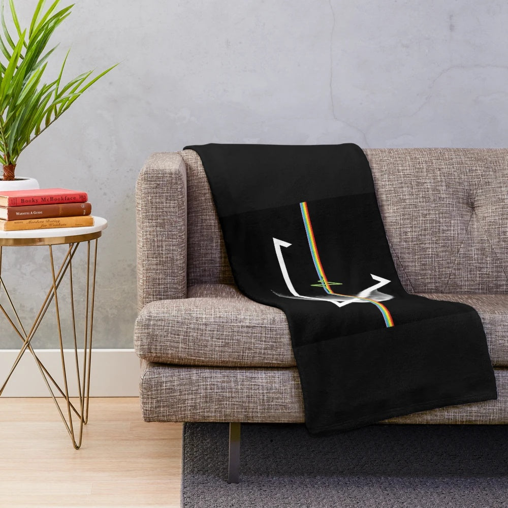 Pink Floyd Dark Side of the Moon inspired plush blanket with rainbow design