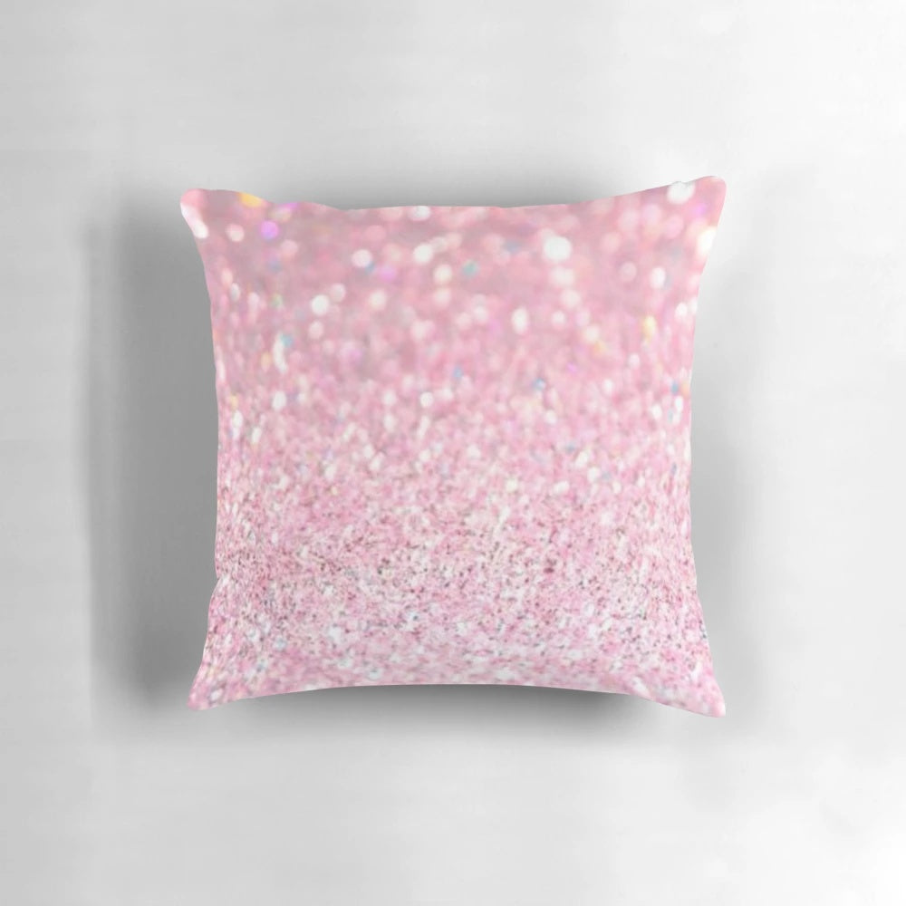 Pink glitter pillow with a soft, plush texture perfect for adding a touch of whimsy to any room.