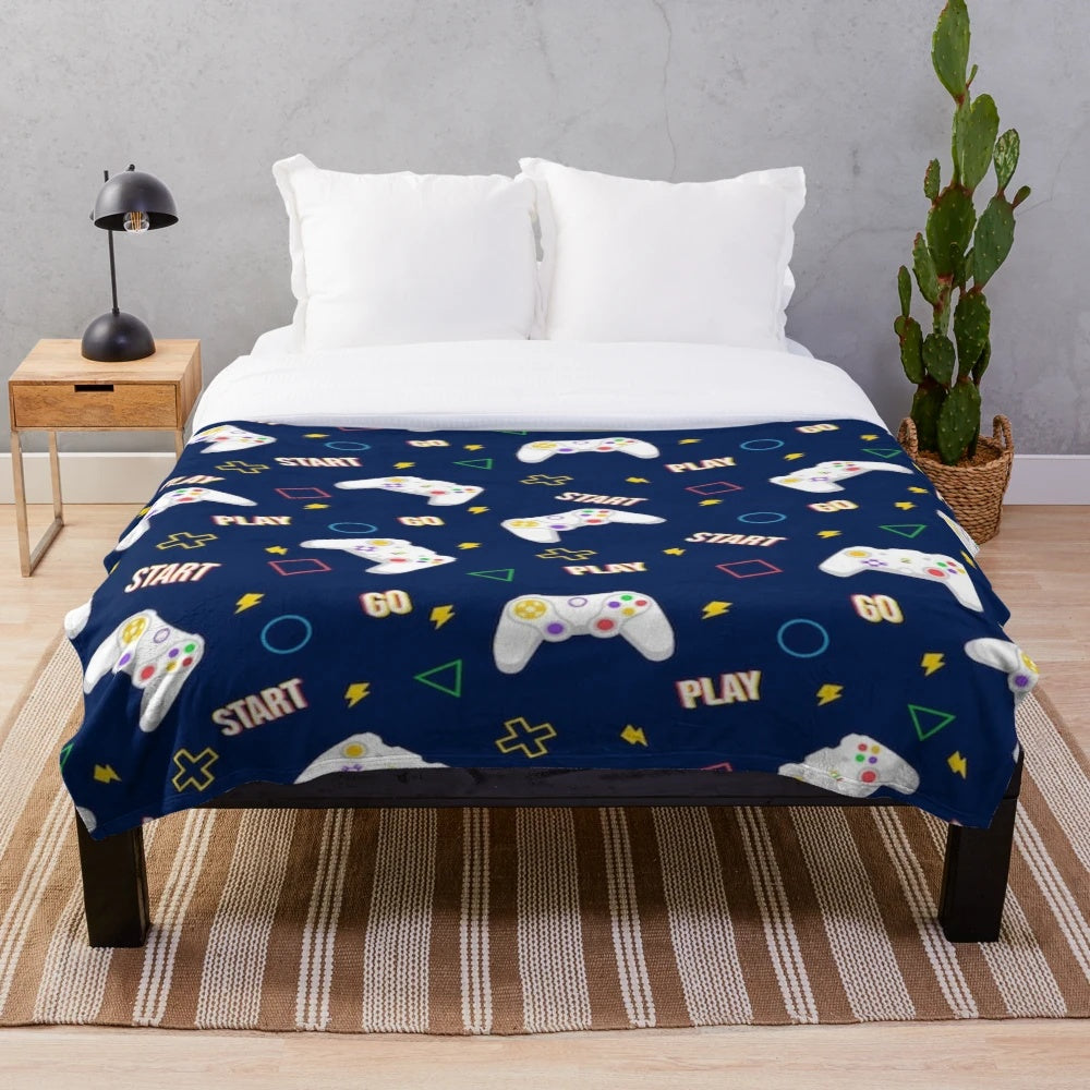 Plush video game patterns blanket with retro gaming controller designs