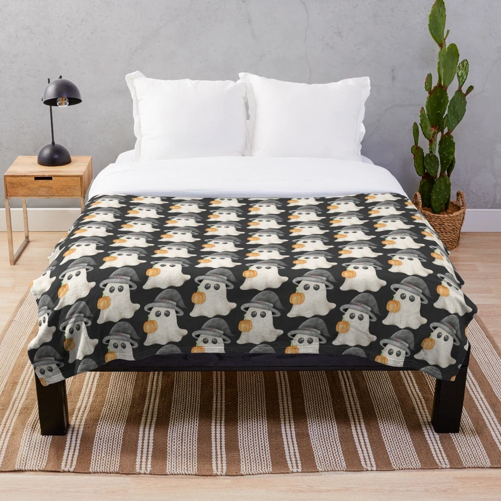Soft and fluffy plush blanket featuring a cute ghost pumpkin design