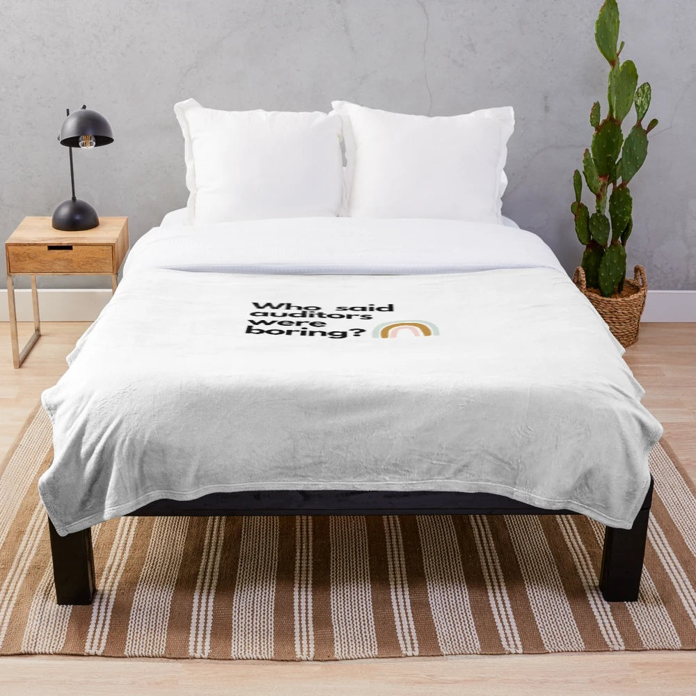 Plush blanket featuring a rainbow design and text about accountants, auditors, and bookkeepers