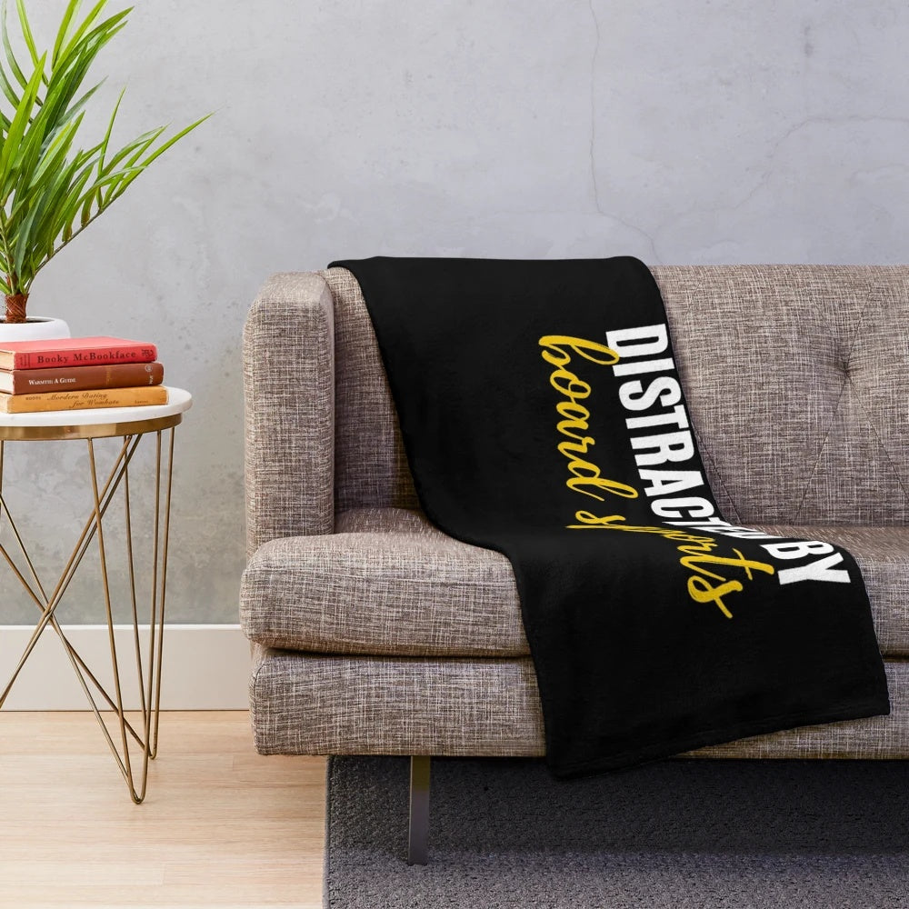 Plush blanket with "Easily Distracted By Board Sports" design