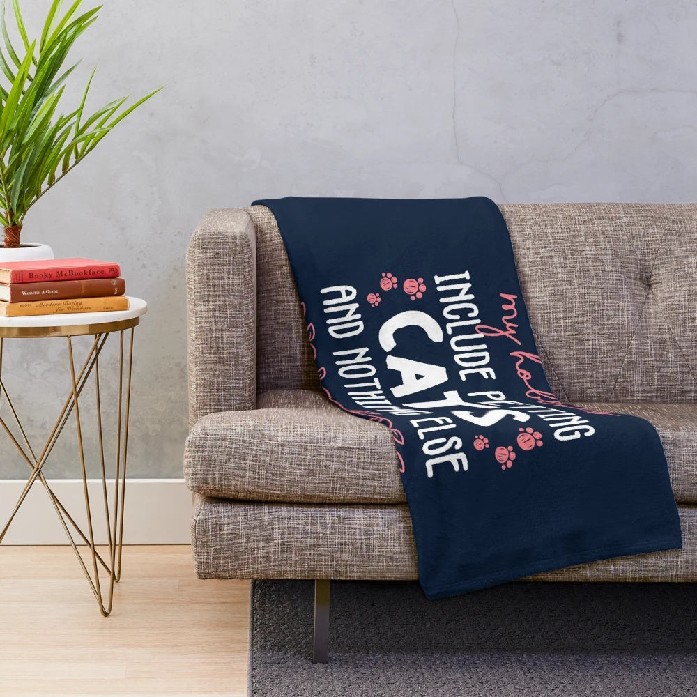 Plush blanket featuring the text "My hobbies include petting cats and nothing else