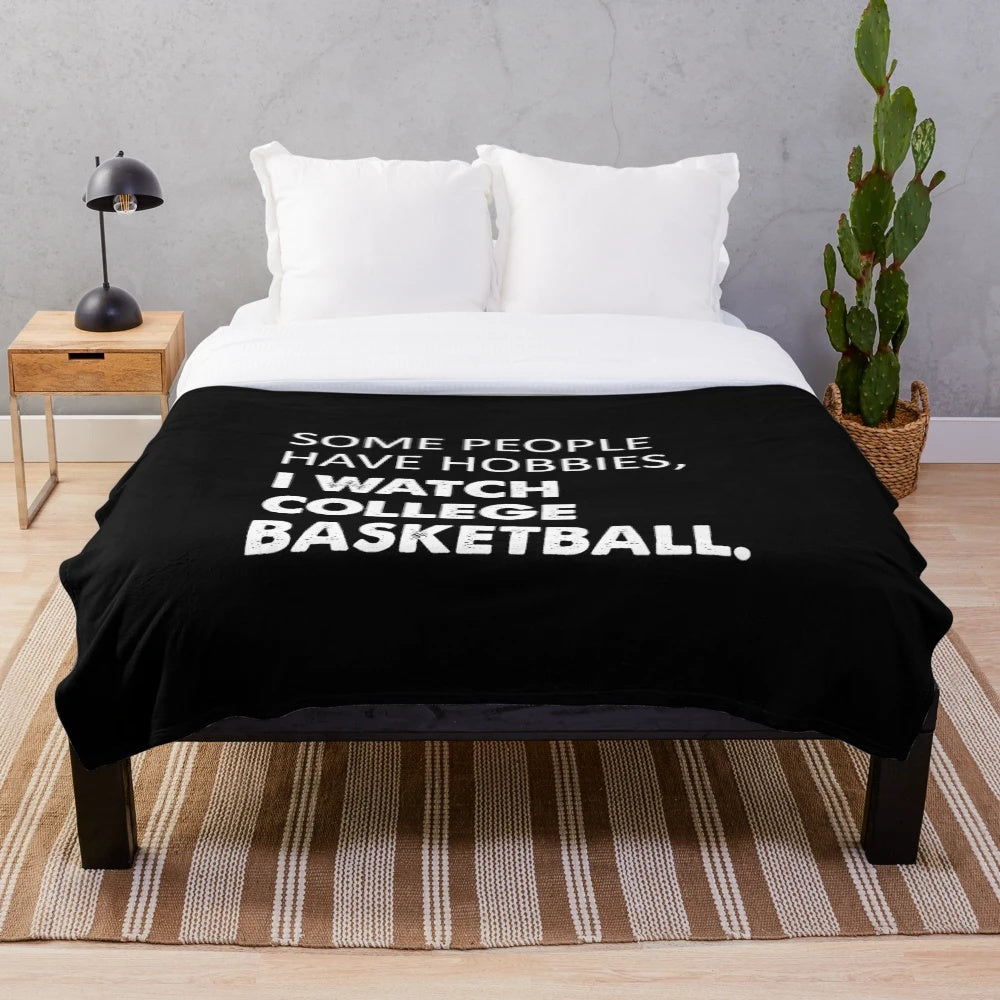 Cozy plush blanket with college basketball design