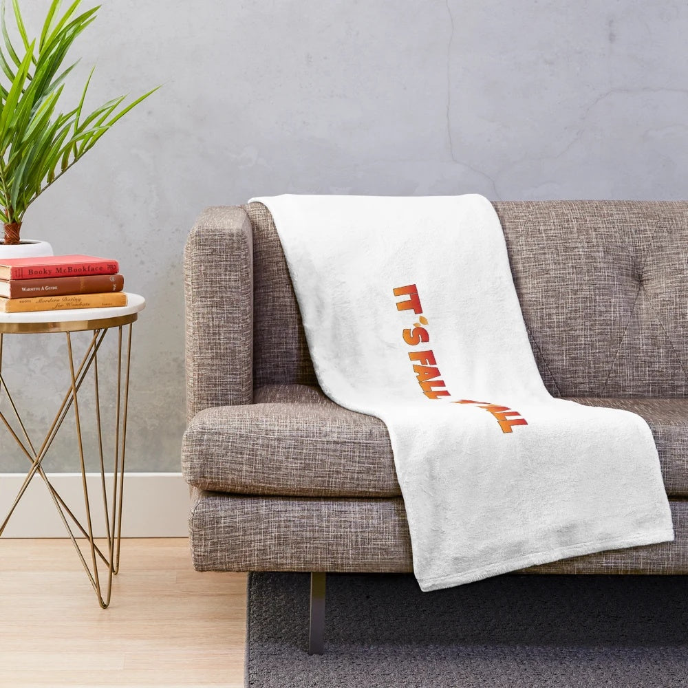 Cozy plush blanket with autumn leaves and orange design