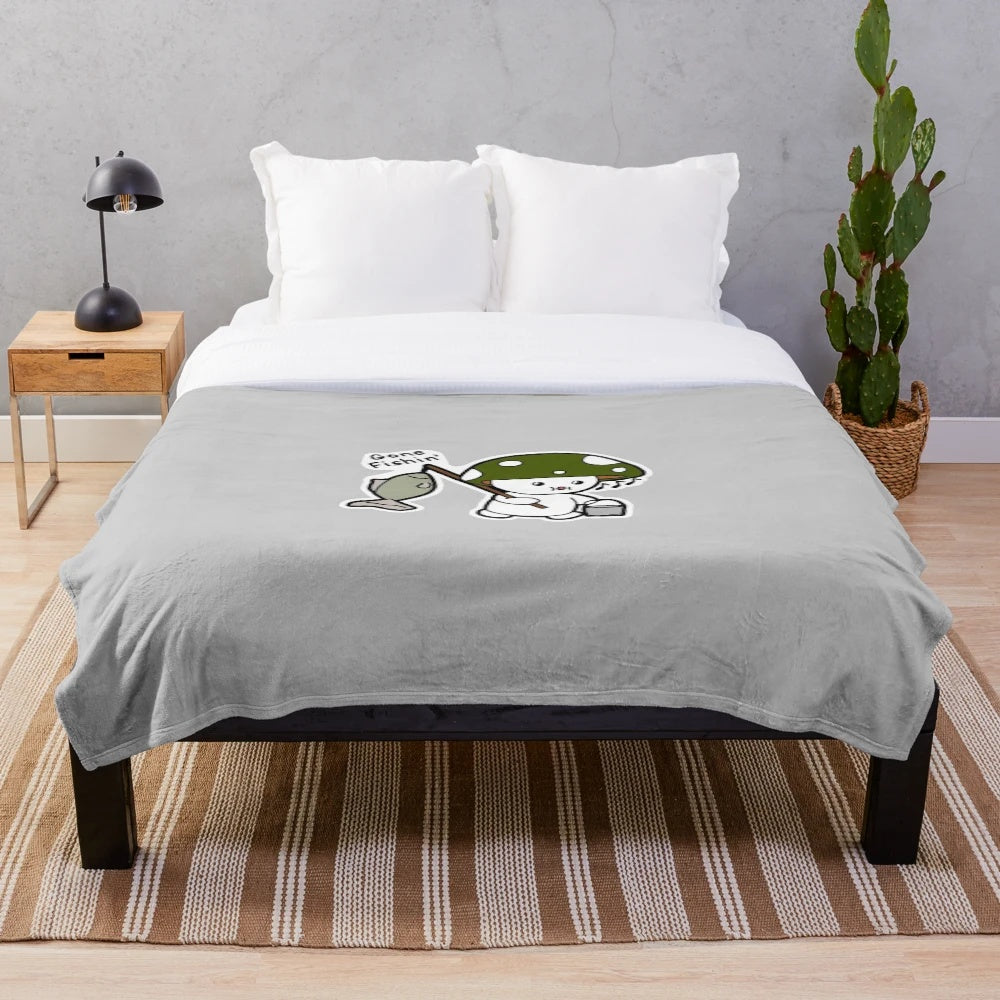 Cozy plush blanket with a whimsical fishing design