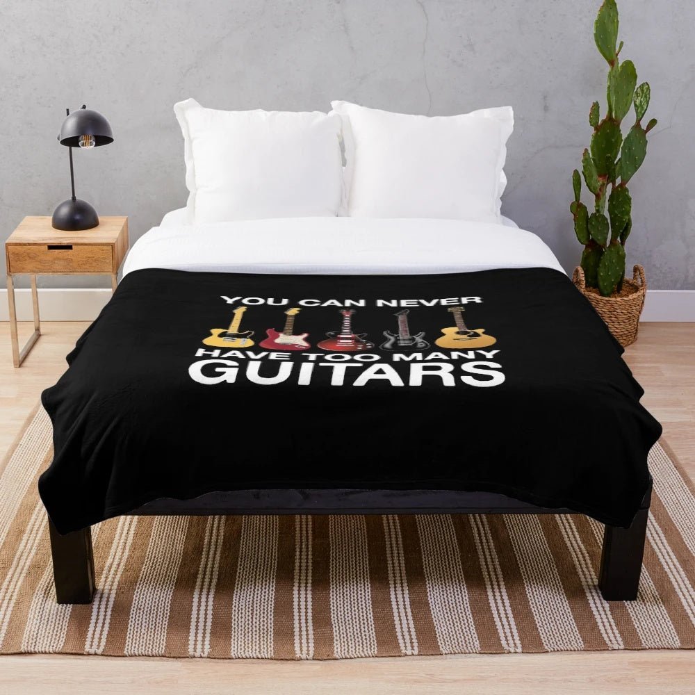Cozy plush blanket with guitars and music-themed design
