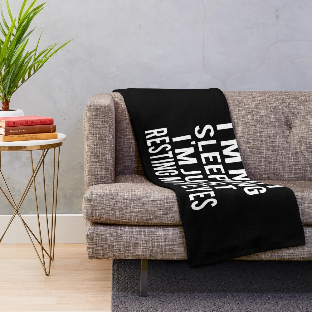 Plush blanket with "I'm Not Sleeping I'm Just Resting My Eyes" quote
