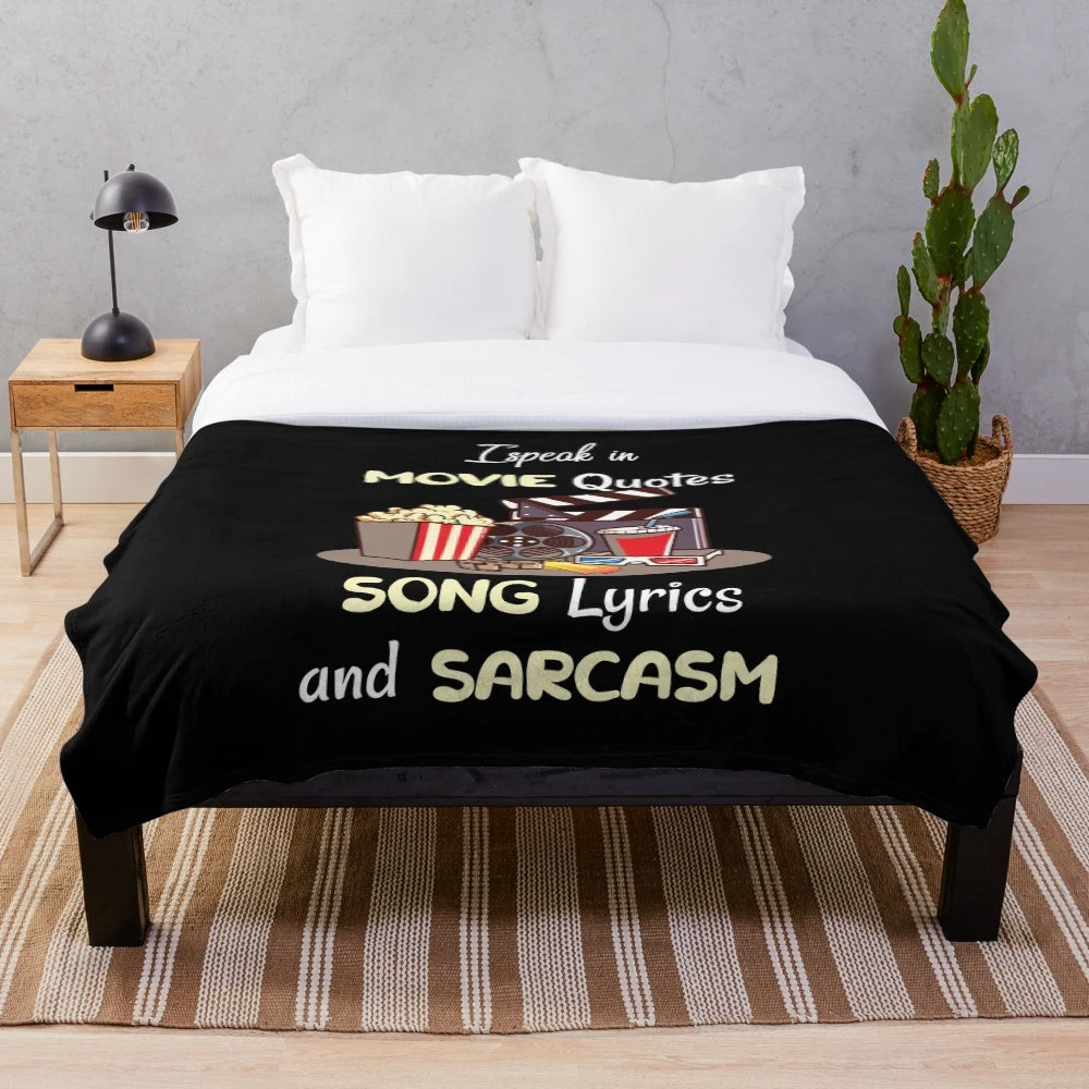 Plush blanket with movie quotes, song lyrics, and sarcasm design