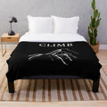 Plush blanket with rock climbing design