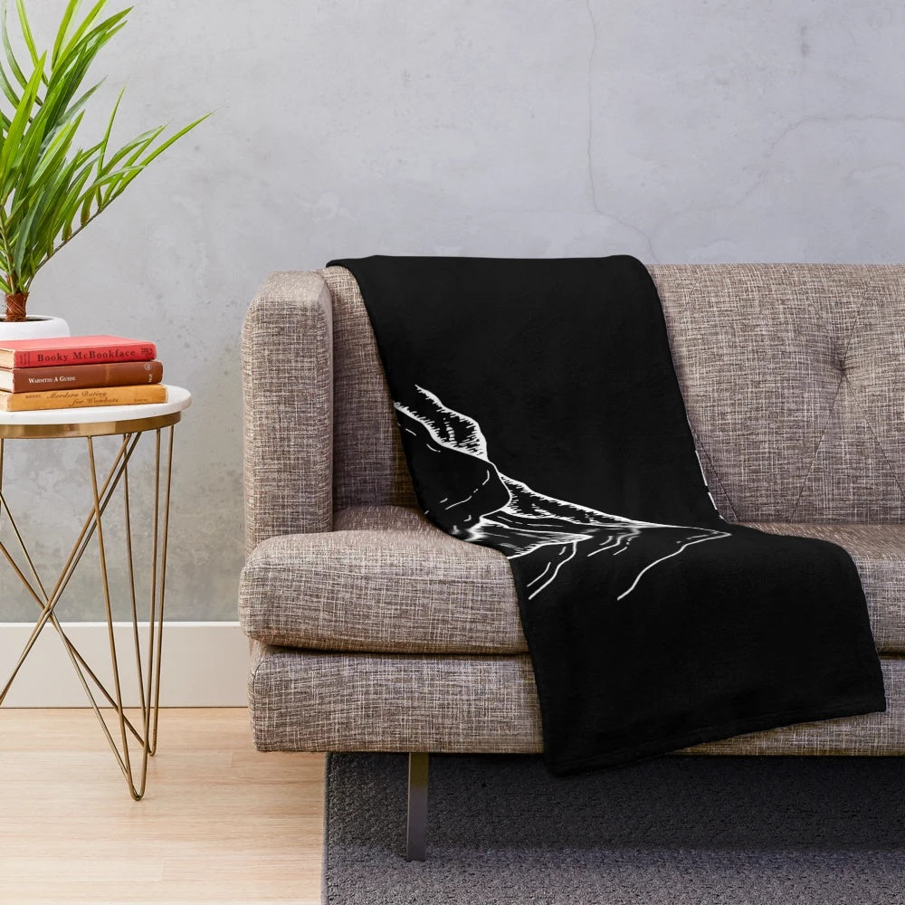 Plush blanket with rock climbing design