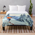 Skiing-themed plush blanket featuring snow-capped mountains and ski icons