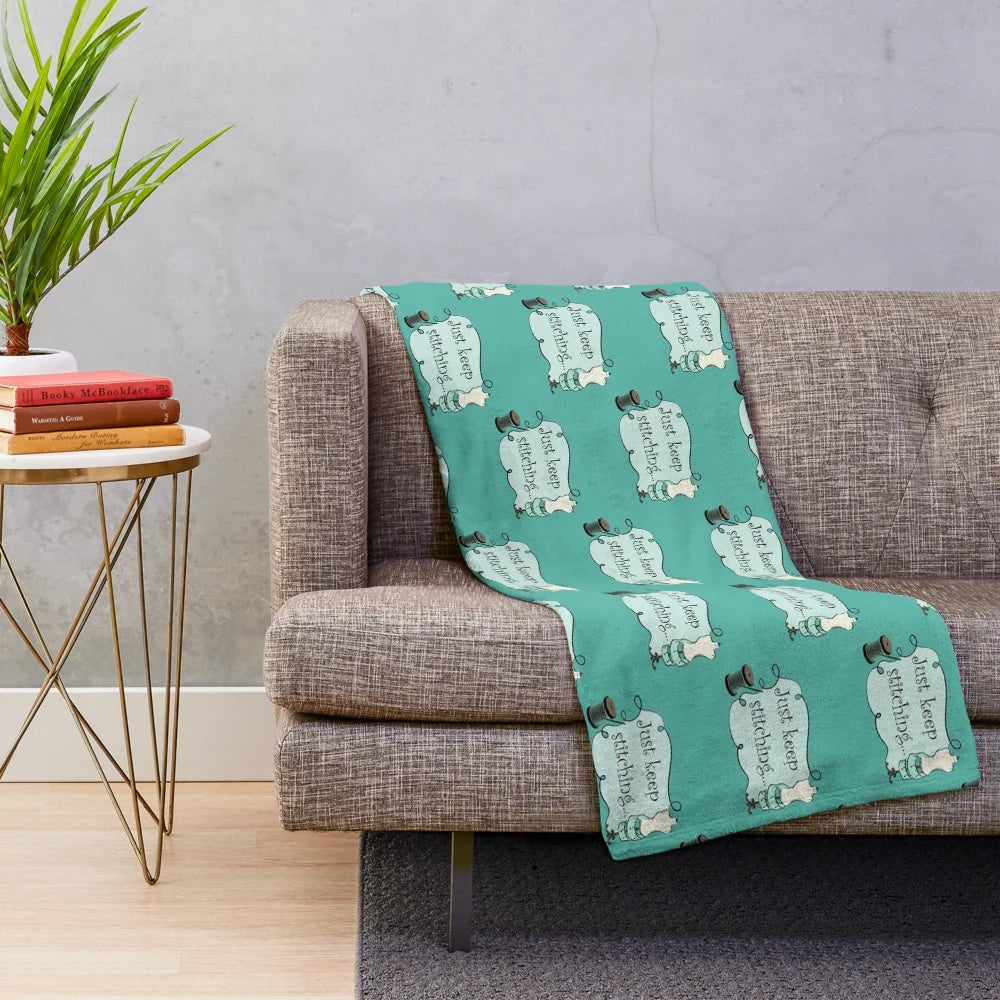 Plush blanket with stitched design