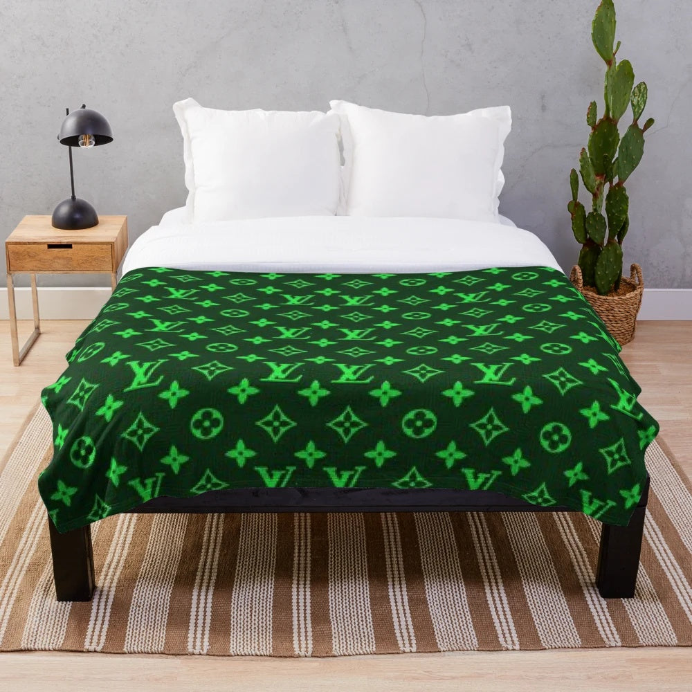 Plush blanket with an adventurous, outdoorsy design