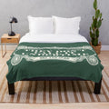 Green plush blanket with sports betting and casino-themed design