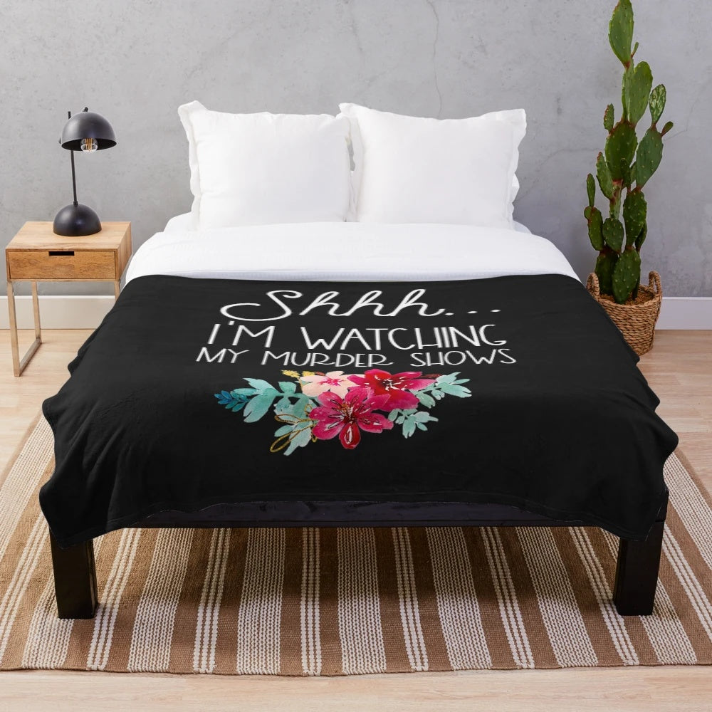Plush blanket with "Shhh, I'm Watching My Murder Shows" text for true crime fans