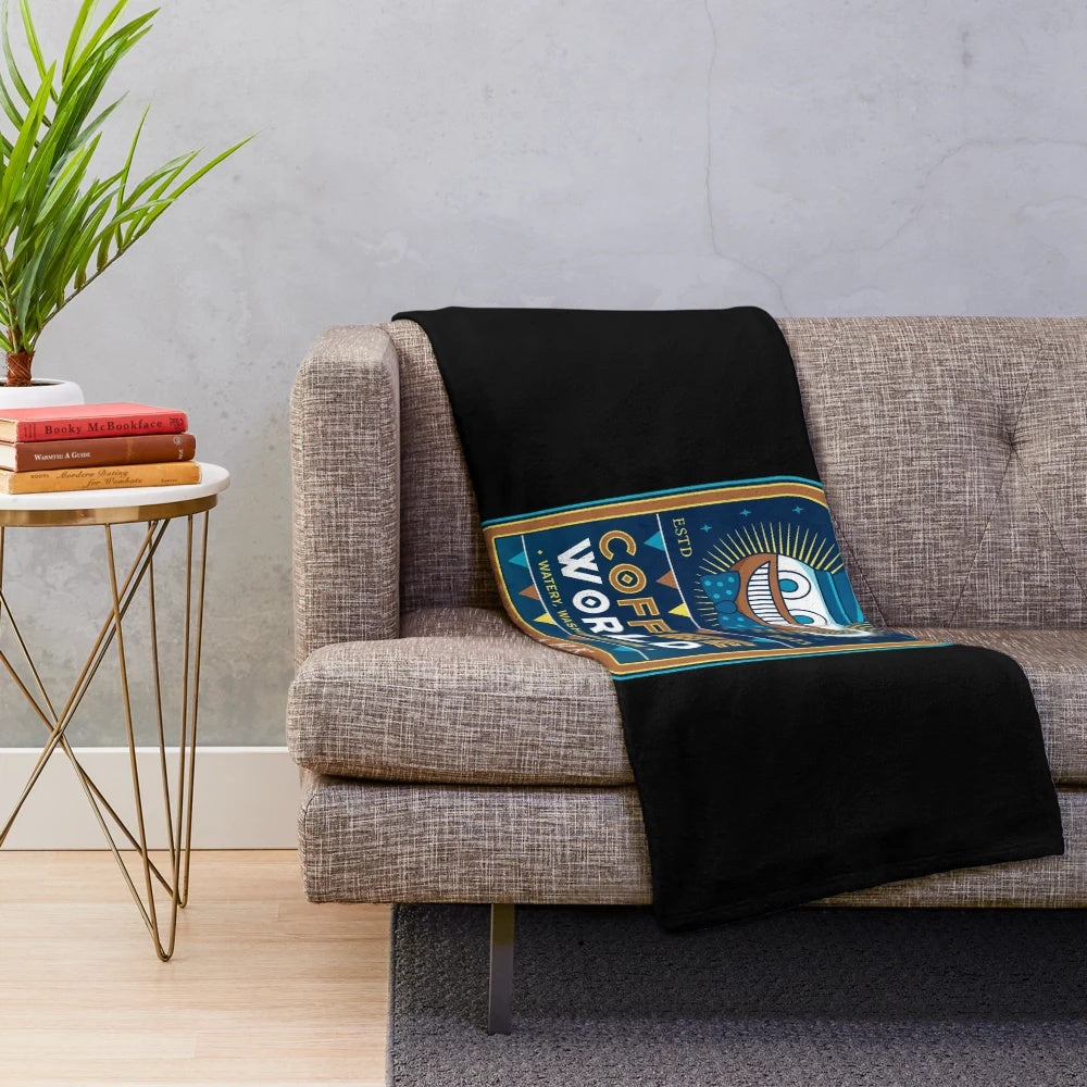 Plush blanket featuring a video game-inspired coffee theme design