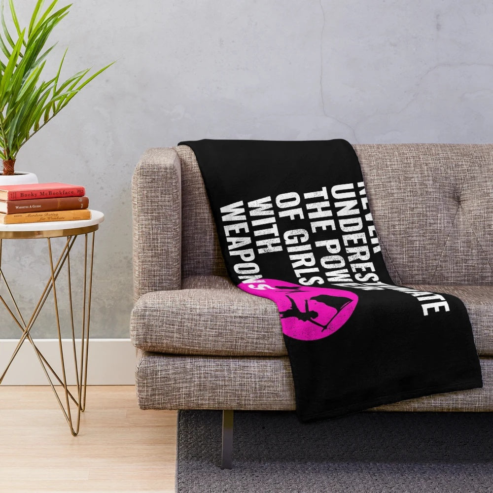 Plush blanket featuring a winter guard dancer design