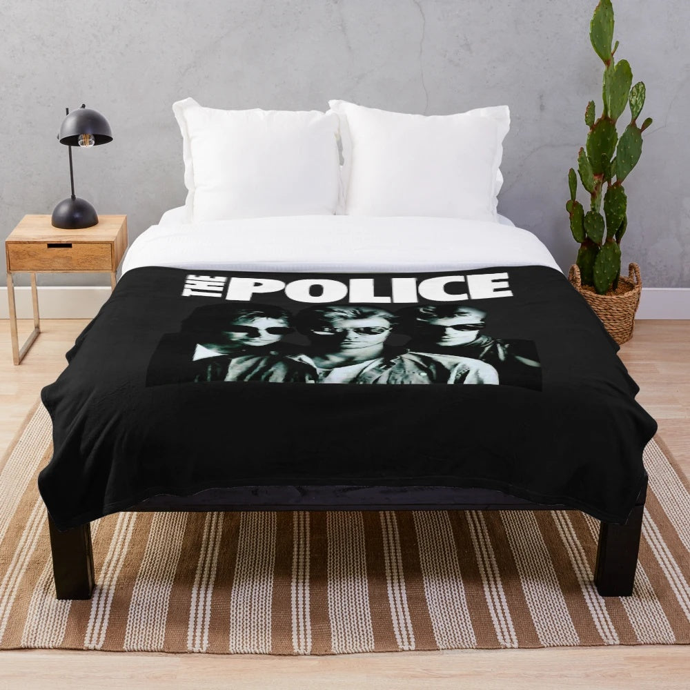 Soft plush blanket featuring the classic rock band The Police