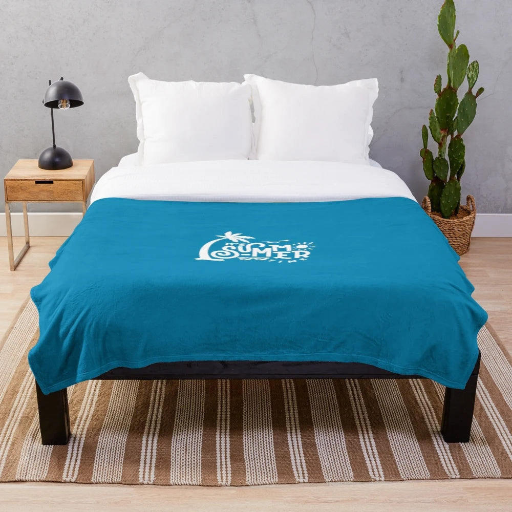 Soft and cozy plush blanket in various colors and patterns, perfect for summer nights