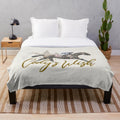 Plush blanket featuring a 2023 horse racing design