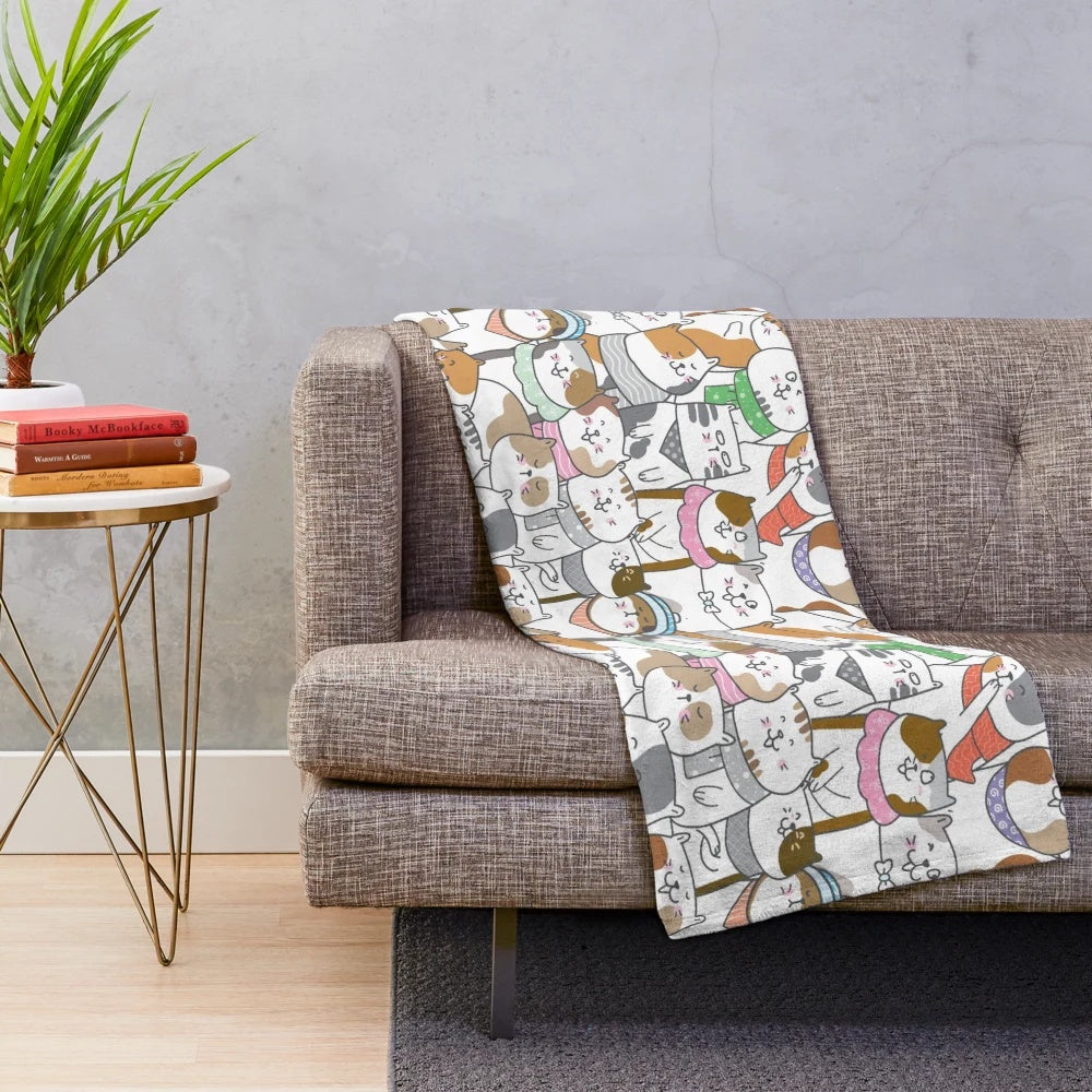 Soft, plush blanket featuring a pattern of adorable animal illustrations