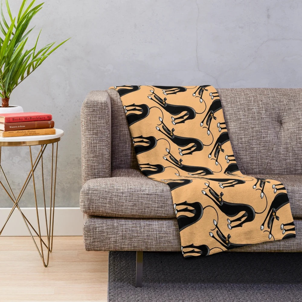 Plush blanket with cartoon dogs in a Bowdown pattern design