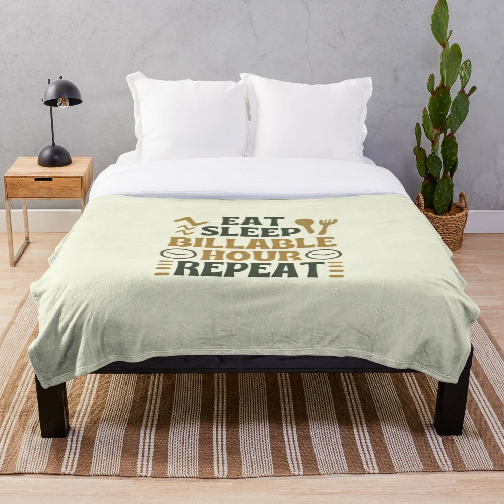 Plush blanket with "Eat Sleep Billable Hour Repeat" design, a humorous gift for lawyers and legal professionals